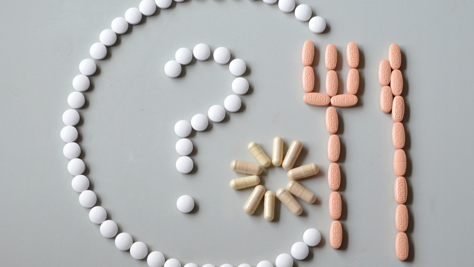 point d'interrogation dessiné avec des médicaments